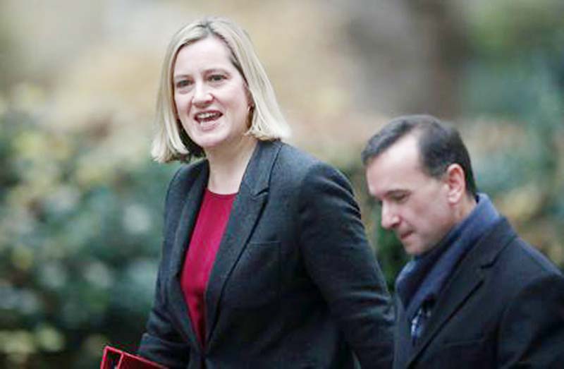 Britain's Secretary of State for Work and Pensions Amber Rudd, and Secretary of State for Wales Alun Cairns arrive in Downing Street, London.