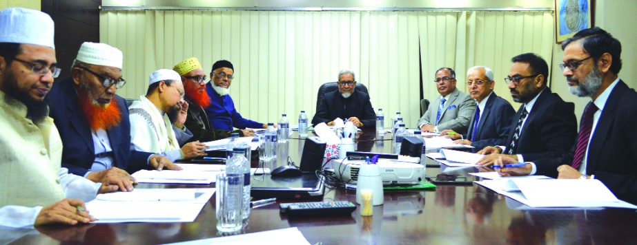 M. Azizul Huq, Chairman, Shariah Supervisory Committee of Islamic Finance and Investment Limited (IFIL), presiding over its 47th meeting at its head office in the city on Wednesday. AZM Saleh, Managing Director, Abul Quasem Haider, Sponsor and founding Ch