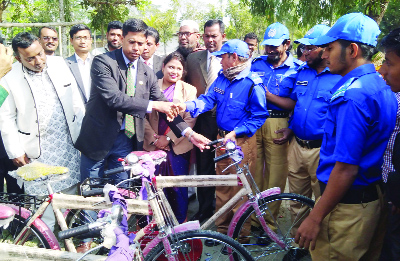 PATUAKHALI: Returning Officer and Deputy Commissioner Md Matiul Islam Chowdhury distributing cycles among village police for performing election duty yesterday.