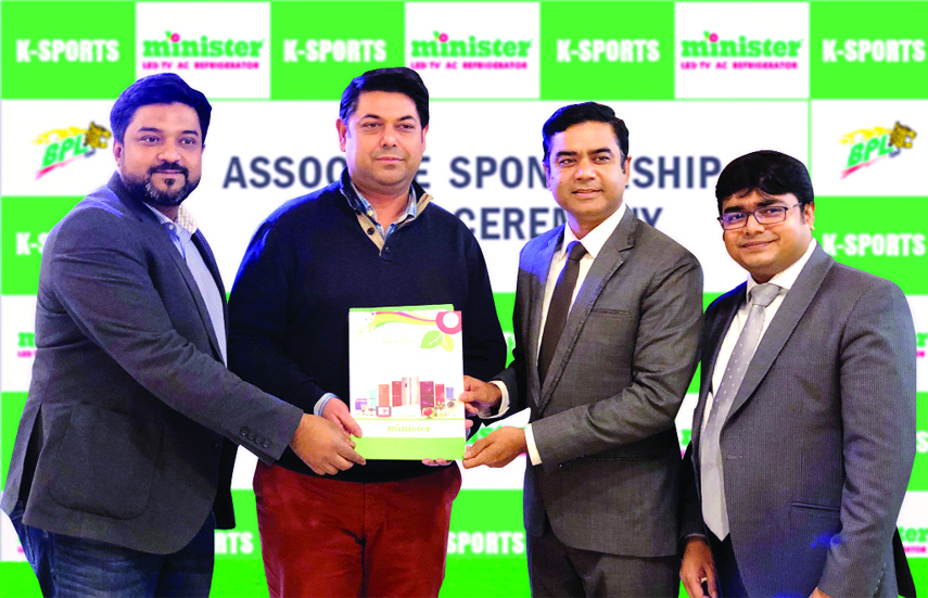 CEO of K-Sports Fahad MA Karim and Chairman of Minister High-Tech Park Limited A Razzak Khan showing agreement paper after signing an agreement on behalf of their respective organizations at the Head Office of Minister High-Tech Park Limited in the city'