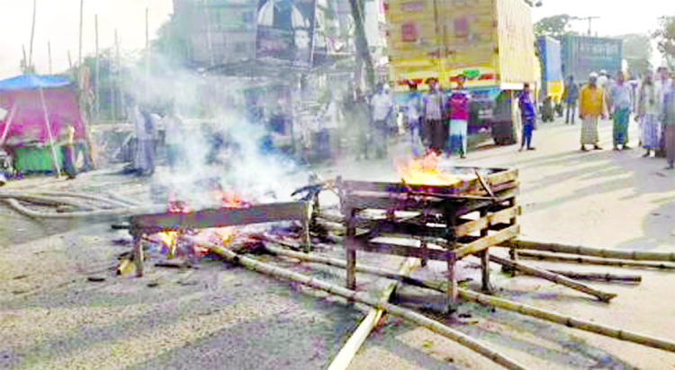 Motorcade of BNP Secretary General Mirza Fakhrul Islam Alamgir was intercepted by allegedly AL-men at Madanpur area in N'ganj by setting fire to tyres and bamboos on Friday.