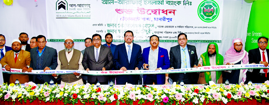 Md. Anowar Hossain, former Chairman and current Director of Al-Arafah Islami Bank Limited, inaugurating its 167th branch at Takerhat in Rajoir in Madaripur on Thursday as chief guest. Farman R Chowdhury, Managing Director, Md. Monjur Hasan, Engr. Md. Habi