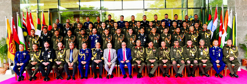 President Md Abdul Hamid seen with the participants of National Defence Course (NDC) and Armed Forces War Course (AFWC) in a photo session at Sheikh Hasina Complex at Mirpur Cantonment yesterday .