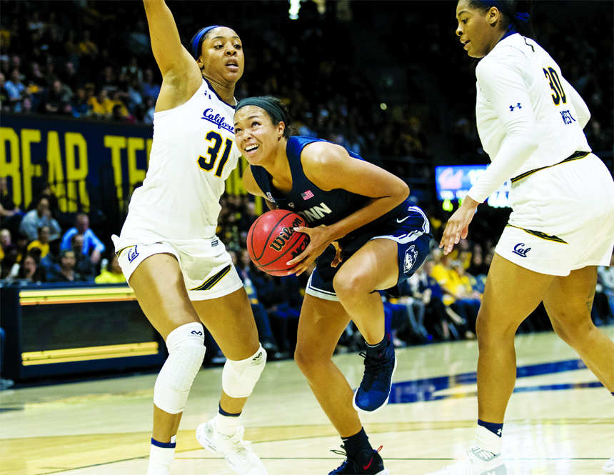 Connecticut forward Napheesa Collier (center) looks to shoot as California forwardcenter Kristine Anigwe (31) and center CJ West (right) defend in the second quarter of an NCAA college basketball game in Berkeley, Calif on Saturday.