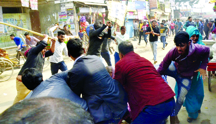 BNP candidate for Dhaka-9 Seat Afroza Abbas' election campaign in Mugda (Maniknagar) area came under attack allegedly by some Awami League activists in presence of law enforcers on Sunday.