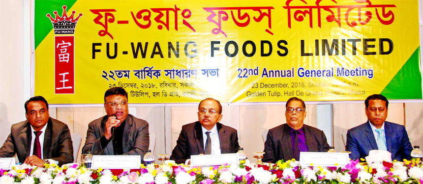 Abdul Quader, Chairman of the Board of Directors of Fu-Wang Foods Limited, presiding over its 22nd Annual General Meeting at a hotel in the city on Sunday. Dr. Arif Ahmed Chowdhury, CIP- Managing Director, Kamal Kanti Mondal- Director, Md. Motiur Rahman-