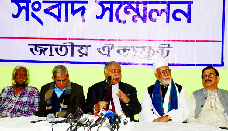 Convenor of Jatiya Oikyafront Dr. Kamal Hossain speaking at a press conference at its office in the city on Monday in protest against arrest and attack all over the country.