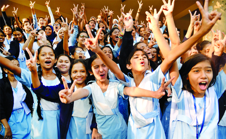 Students of Viqarunnisa Noon School celebrating their outstanding results in JSC, and PSC examinations on Monday.