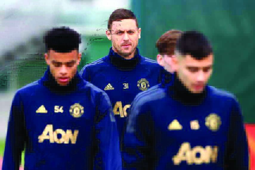 Man Utd players taking part at the training session at Old Trafford in England on Tuesday.