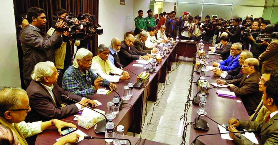 Jatiya Oikyafront Convener Dr Kamal Hossain along with other senior leaders of the Front holding talks with Chief Election Commissioner KM Nurul Huda at Nirbachon Bhaban on Tuesday over attack on their party candidates and campaigners across the country.