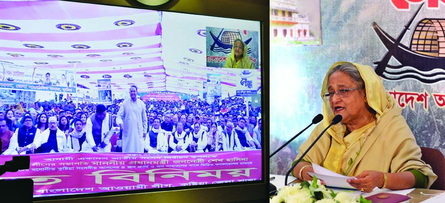Prime Minister Sheikh Hasina addressing the Chandpur, Kushtia and Naogaon through video conferencing at Dhanmondi's Sudha Sadan on Wednesday. PID photo