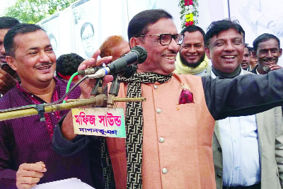 DAGHONBHUYA(Feni): Road Transport and Bridges Minister Obaidul Quader speaking at an election campaign in favour of Grand Alliance candidate Lt Gen (Retd) Masud Uddin Chowdhury from Feni -3 Seat as Chief Guest at Daghonbhuya Upazila on Tuesday.