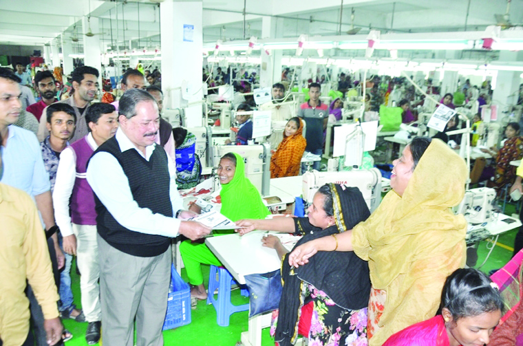 BARISHAL: Oikyafront candidate Adv Md Mojibur Rahman Sarowar from Barishal- 2 distributing leaflets among the garment's labourers at Bengal Biscuit Company Ltd at BSIC area on Tuesday.