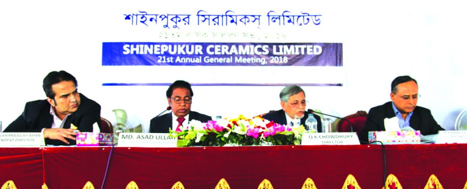 O K Chowdhury, Director of Shinepukur Ceramics Limited, presiding over its 21st AGM at Beximco Industrial Park in Kashimpur in Gazipur on Saturday. Masud Ekramullah Khan, Independent Director, Mohammad Humayun Kabir, CEO and senior officials of the compan