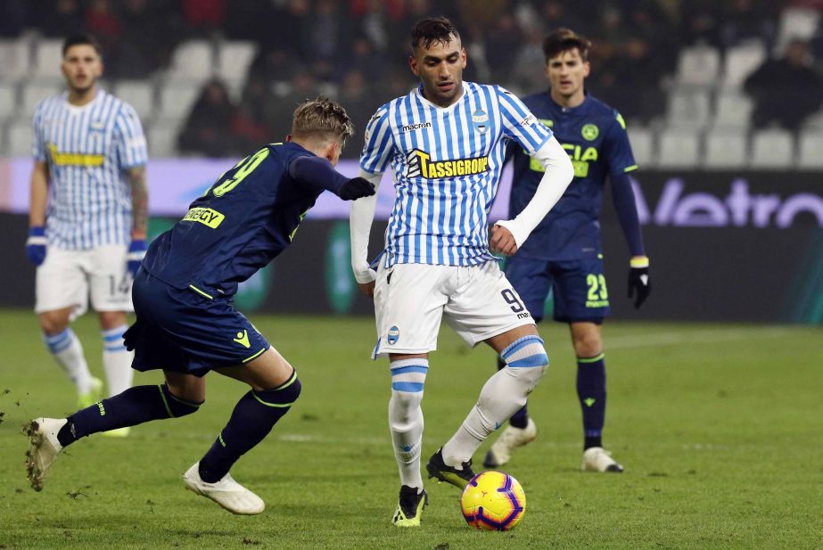 Spal's Mohamed Fares (right) and Udinese's Jens Larsen fight for the ball during the Italian Serie A soccer match between Spal and Udinese in Ferrara, Italy on Wednesday.