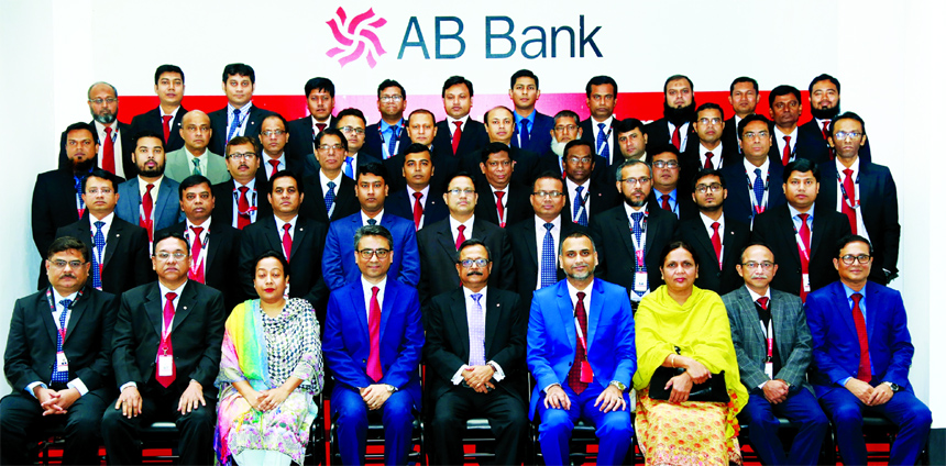 Sajjad Hussain, DMD of AB Bank Limited, poses for a photo session with the participants of a "Refresher Training for Operations Managers" organized by the Bank's Training Academy at the Academy in the city recently. Senior executives of the Banks were