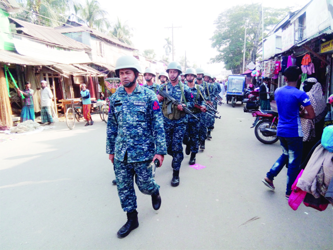 BARGUNA: Members of Bangladesh Navy patrolling in coastal belt ahead of national election . This picture was taken from Amtali in Barguna yesterday