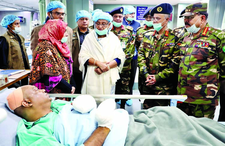 Prime Minister Sheikh Hasina visited injured Awami League leader of Dinajpur Dr. Mahbubur Rahman at the Combined Military Hospital in the city on Saturday. Mahbubur was attacked by BNP-Jamaat activists. BSS photo