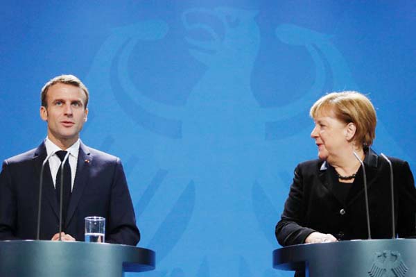 French President Emmanuel Macron and German Chancellor Angela Merkel (pictured November 2018) welcomed the latest ceasefire announcement in Ukraine