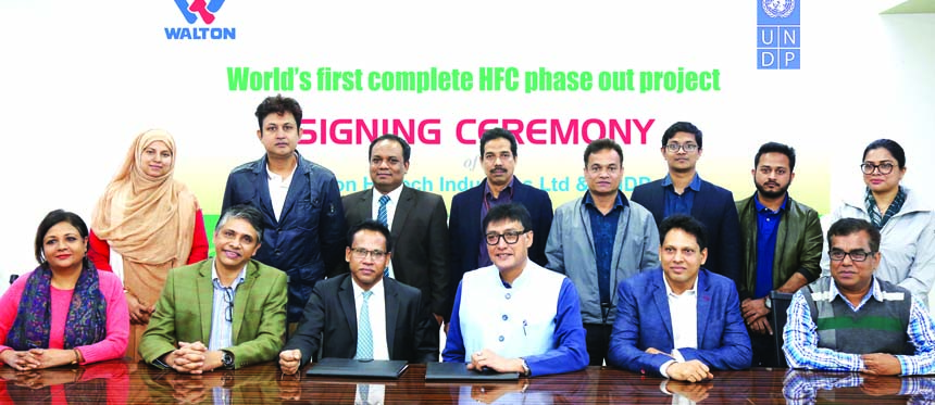 SM Ashraful Alam, Managing Director of Walton Hi-Tech Industries Limited, Sudipto Mukerjee, Resident Representative of UNDP Bangladesh, SM Mahbubul Alam, Director of Walton Group, alongwith other high officials of Walton and UNDP Bangladesh, poseâ€™s