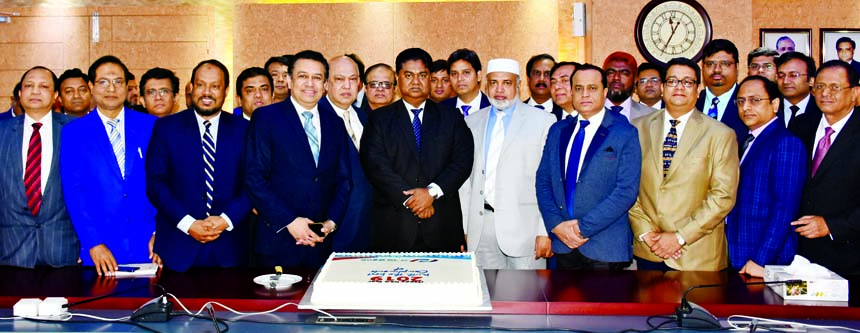 Mosleh Uddin Ahmed, Managing Director of NCC Bank along with other Senior Executives of the Bank celebrates the "Happy New Year-2019" occasion by cutting a cake at its head office in the city on Tuesday. Khondoker Nayeemul Kabir, Md. Habibur Rahman, DMD