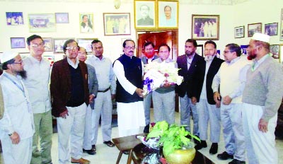 SYLHET: Newly- elected MP from Sylhet-3 Mahmud us Samad being greeted by professionals at his residence on Tuesday .