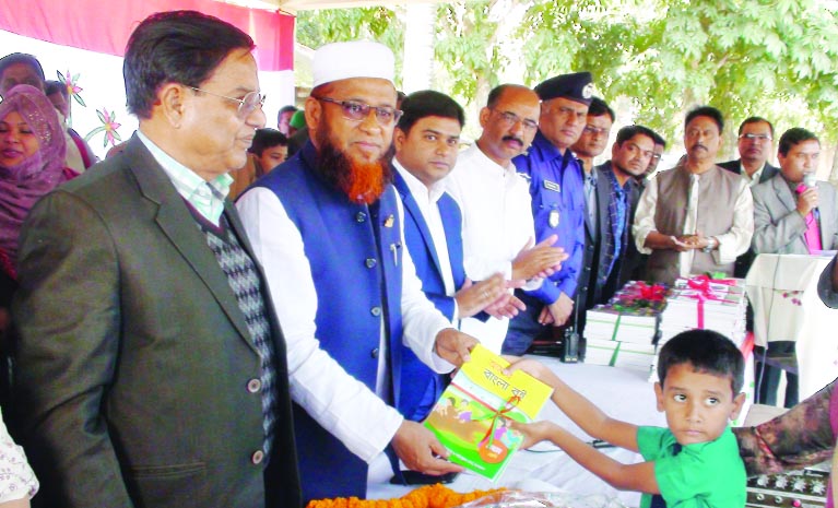 BHALUKA (Mymensingh ): Alahj Kazimuddin Ahmed Duno, newly- elected MP from Mymensingh-11 Constituency distributing textbooks among the students at Bhaluka Pilot High School and Primary School in observance of the Textbook Festival on Tuesday.