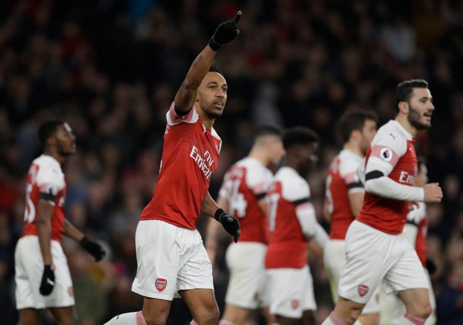 Arsenal's Pierre-Emerick Aubameyang celebrates after scoring his side's fourth goal during the English Premier League soccer match between Arsenal and Fulham at Emirates stadium in London on Tuesday.