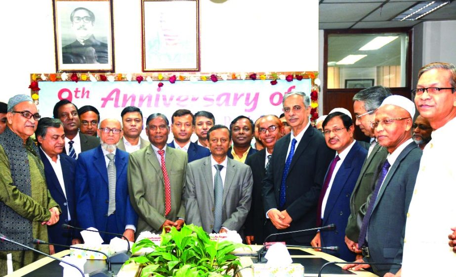 Manjur Ahmed, Managing Director of Bangladesh Development Bank Limited (BDBL), inugurating its 9th Anniversary programme at the Bank's head office in the city on Thursday. Md. Abu Hanif Khan, Kazi Tariqul Islam and Shahabuddin Ahmed, Secretary of Ministr