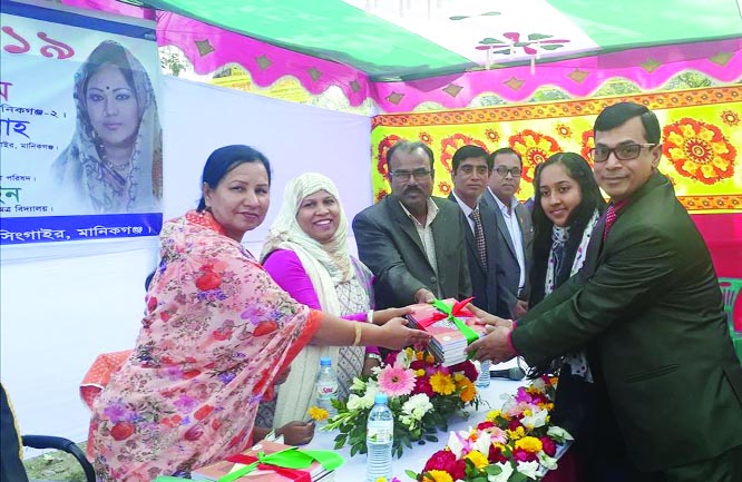 MANIKGANJ: The Text book Festival was observed at Singair Govt High School on Tuesday. Raheal Rahamat Ullah, UNO was present as Chief Guest. Md Akram Hossain, Headmaster of the School presided over the programme.