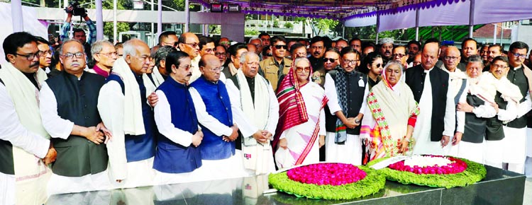 Prime Minister Sheikh Hasina along with the newly elected MPs paying homage to Bangabandhu Sheikh Mujibur Rahman at his portrait at Dhanmondi and stood there in solemn silence for sometime after placing wreaths on Friday.