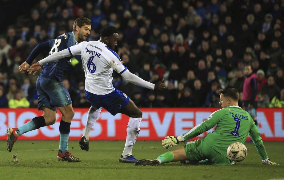 Tottenham's Fernando Llorente (left) scores his side's fifth goal during the English FA Cup third round soccer match between Tranmere Rovers and Tottenham Hotspur at Prenton Park stadium in Birkenhead, England on Friday.