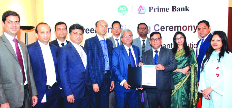 Md. Touhidul Alam Khan, DMD of Prime Bank Limited and Pradip Kar Chowdhury, Executive Director (Finance and Planning) of ACI Group, exchanging an agreement signing document on "Structured Collection & Payment Solution" at the Banks head office in the ci