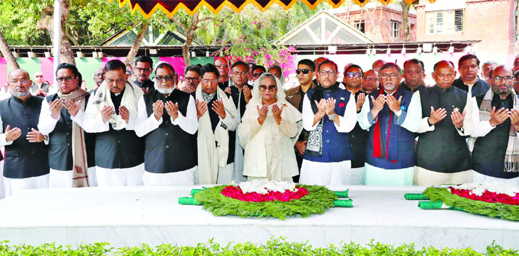 Prime Minister Sheikh Hasina along with new ministers, state ministers and deputy ministers offering munajat after placing wreaths at the mazar of the Father of the Nation Bangabandhu Sheikh Mujibur Rahman at Tungipara on Wednesday.