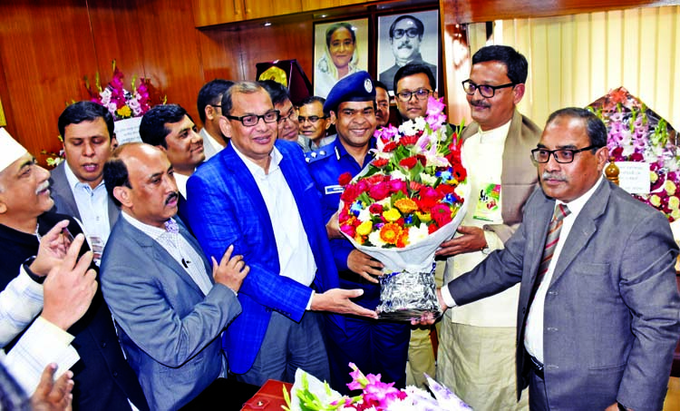 Dhaka University Vice-Chancellor Prof Dr Akhtaruzzaman inaugurating book distribution among the students of University Laboratory School and College in the city on Thursday.