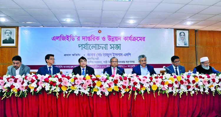 LGRD and Cooperatives Minister Md Tajul Islam MP speaking as the chief guest at a review meeting of development activities and view exchange meeting at LGED Headquarters at Agargaon in the city yesterday. Among others, Dhaka South City Corporation Mayor