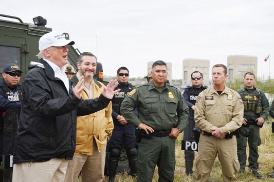 US President Donald Trump(L) speaks after he received a briefing on border security next to Sen. Ted Cruz R-TX near the Rio Grande in McAllen, Texas on Thursday.