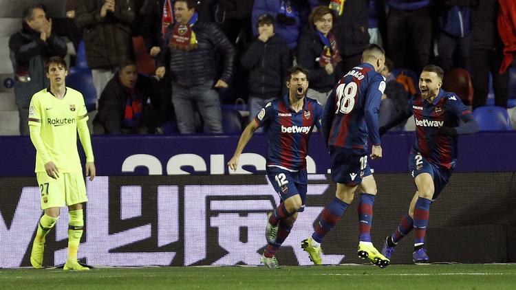 Erick Cabaco (second right) celebrates after scoring against Barcelona during the la Copa del Rey round of 16 first leg soccer match between Levante and Barcelona at the Ciutat de Valencia stadium in Valencia, Spain on Thursday.