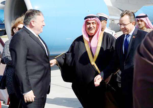 US Secretary of State Mike Pompeo is greeted by Bahraini Foreign Minister Khalid bin Ahmed Al Khalifa after arriving at Manama International Airport in Manama on Frodau.