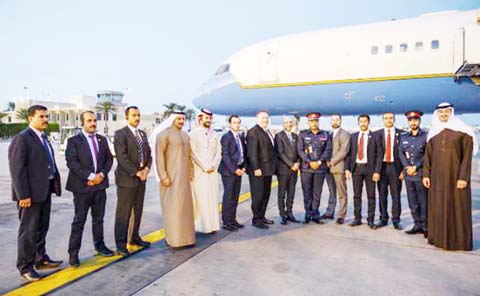 U.S. Secretary of State Mike Pompeo, center, poses with his local security team before departing Manama International Airport in Manama, Bahrain on Friday