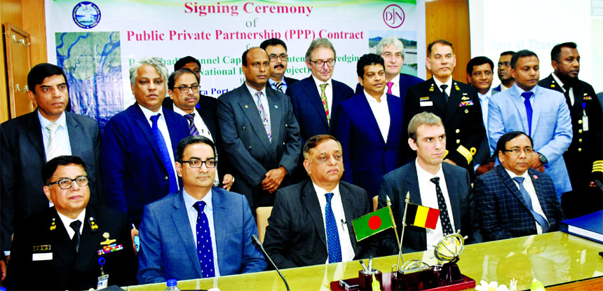 Commodor M Jahangir Alam, Chairman of Payra Port authority and David Jonckheere, Chairman of Jan De Nul Dredging Company (Belgium), poses for a photograph after signing an agreement to procure 17 dredgers to improve navigability on waterways side by side