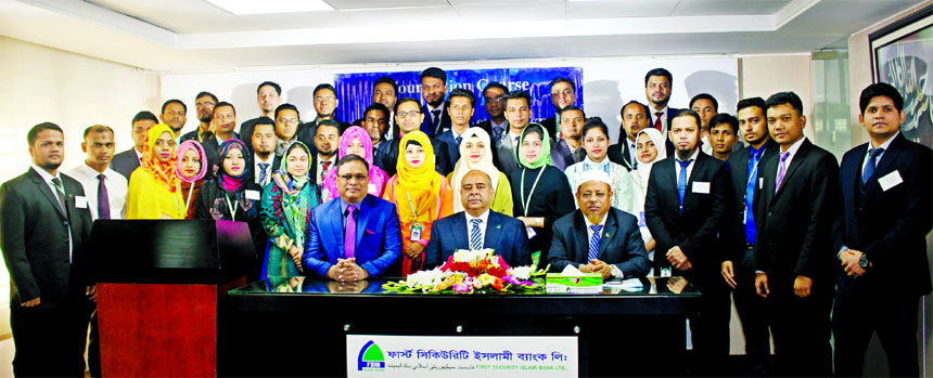 Syed Waseque Md. Ali, Managing Director of First Security Islami Bank Limited, poses for a photograph with the participants of its 46th Foundation Course of Trainee Junior Officers at its Training Institute on Sunday. Md. Ataur Rahman, Principal, Muhammad