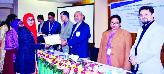 RANGPUR: Prof Dr Nazmul Ahsan Kalimullah,VC, Begum Rokeya University giving certificates as Chief Guest among the trainee female students on completion of 'Women Entrepreneurship Training' on Monday.