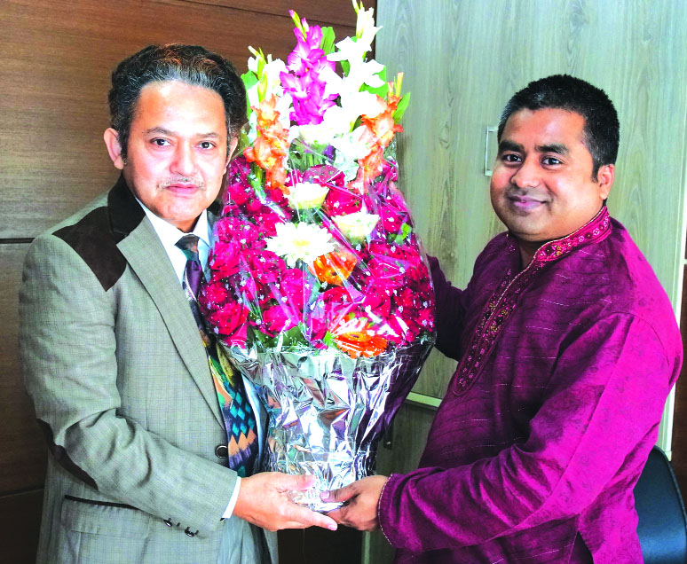 Young entrepreneur Sayed Atiq, congratulating with bouquet to Nazmul Hossain, Deputy Managing Director of Unimed Unihealth Pharmaceuticals Limited, for her outstanding contribution in the company.