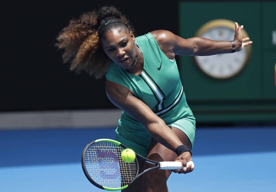 United States' Serena Williams hits a forehand return to Germany's Tatjana Maria during their first round match at the Australian Open tennis championships in Melbourne, Australia on Tuesday.