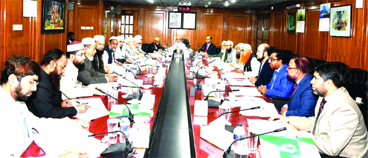 Sheikh Moulana Mohammad Qutubuddin, Chairman of Shari`ah Supervisory Committee of Islami Bank Bangladesh Limited, presiding over its meeting at the Banks head office in the city recently. Mohammed Monirul Moula, AMD of the Bank, Dr. Mohammad Abdus Samad,