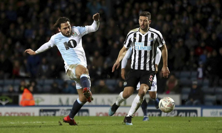 Blackburn's Bradley Dack takes a shot on goal during the Emirates FA Cup third round replay soccer match against Newcastle United at Ewood Park, Blackburn on Tuesday.