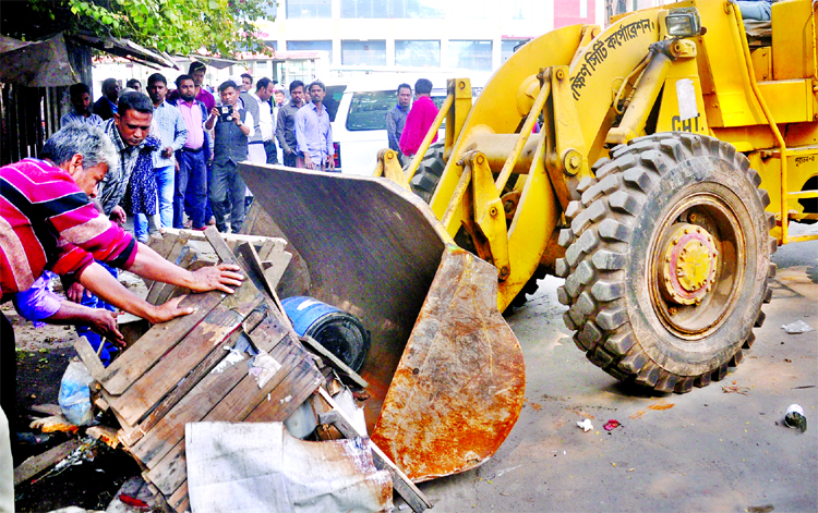 Dhaka South City Corporation evicted different makeshift shops on the footpath built illegally around the Jatiya Press Club and Secretariat on Wednesday.