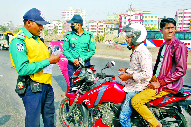 All kinds of vehicles being checked at different points as traffic week began in city for bringing traffic discipline. A motor-cycle being halted at Shanir Akhra on Wednesday for not using helmet by the biker.