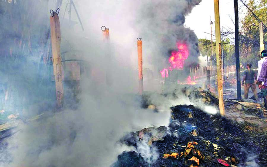 Smokes coming out from the blazing of an oil depot at Abdullahor Ghata area in Sitakunda upazila on Wednesday.